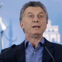 Argentine President Mauricio Macri talks about new poverty numbers released by the National Institute of Statistics and Census, INDEC, during a press conference in Buenos Aires Wednesday. Macri claimed that the previous administration underreported the country\'s poverty rates. | AP