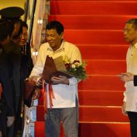 Philippine President Rodrigo Duterte arrives at the Wattay International Airport in Vientiane on Monday for the 28th Association of Southeast Asian Nations (ASEAN) Summit to be held from Tuesday to Thursday. | AFP-JIJI