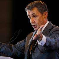 Former French President Nicolas Sarkozy speaks during a campaign meeting in Dozule on Monday. | AFP-JIJI