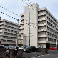 Mazda employee Suguru Kamikawa allegedly kill coworker Kyohei Sugano at this company dorm in Hiroshima, seen Saturday. | KYODO