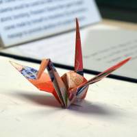 A paper crane folded by U.S. President Barack Obama in Hiroshima in May is displayed at the Nagasaki Atomic Bomb Museum . | KYODO