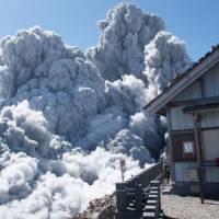 Smoke rises near the peak of Mount Ontake during its eruption on Sept. 27, 2014. The photo was taken by Izumi Noguchi, who failed to escape. The image was retrieved from his camera. | IZUMI NOGUCHI/ VIA KYODO