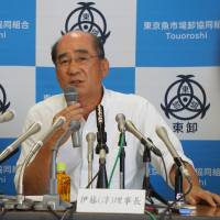 Junichi Ito, head of the Tsukiji fish market wholesalers cooperative, speaks at a news conference Wednesday in Tokyo. | MAGDALENA OSUMI