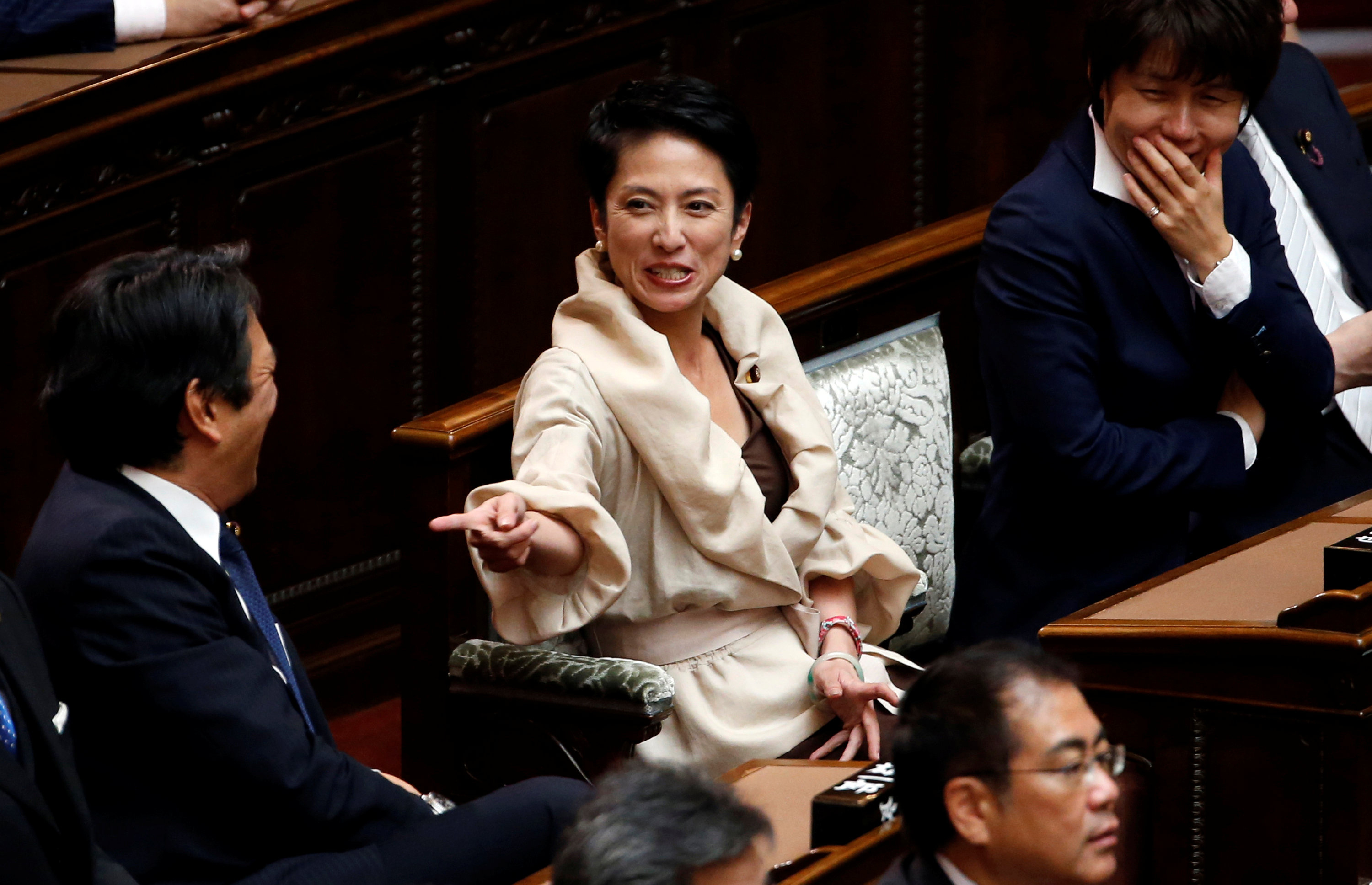 Meet the new boss: Renho, the new leader of the main opposition Democratic Party, talks with Upper House lawmakers before the start of the new Diet session on Monday. | REUTERS