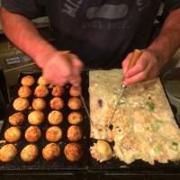 Standing room only: Tempu\'s takoyaki (octopus balls) have a devoted following. | ROBBIE SWINNERTON