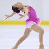 Mako Yamashita hit six triple jumps during Sunday\'s free skate to finish on the podium in her first Junior Grand Prix. | KYODO