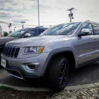 The 2015 Jeep Grand Cherokee is exhibited on a car dealership in New Jersey in 2015. U.S. urges automakers to ensure cybersecurity; senators seek mandatory regime