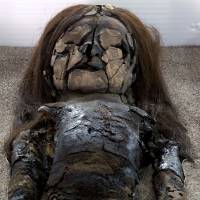 A mummified Chinchorro baby lies inside Azapa\'s San Miguel Museum in Arica, Chile. | REUTERS