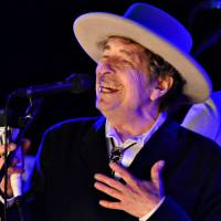 U.S. musician Bob Dylan performs during at The Hop Festival in Paddock Wood, Kent in June 2012. The hallowed musician was named the winner of the Nobel Prize in literature on Thursday for creating \"new poetic expressions within the American song tradition.\" | REUTERS