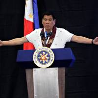 Philippine President Rodrigo Duterte speaks during a meeting with banana production businessmen in Davao city, in the southern Philippines, on Friday. | REUTERS