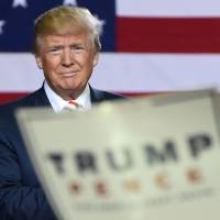 Republican presidential candidate Donald Trump looks on at a campaign rally at the Prescott Valley Event Center Tuesday in Prescott Valley, Arizona. | AFP-JIJI