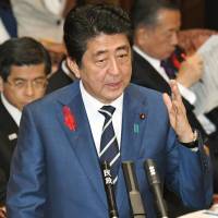 Abe sidesteps opposition grilling on LDP's draft constitution
