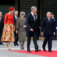 Belgium\'s King Philippe and Queen Mathilde are escorted by Emperor Akihito and Empress Michiko as Crown Prince Naruhito and Crown Princess Masako look on during a welcoming ceremony at the Imperial Palace in Tokyo on Tuesday. | REUTERS