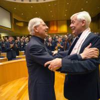 The Rev. Arturo Sosa (right), from Venezuela, is congratulated by the Rev. Adolfo Nicolas after being elected as superior general of the Society of Jesus in Rome on Friday. | AP