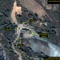 Activity is seen at one of three tunnel entrances at North Korea\'s Punggye-ri nuclear test site in this Oct. 1 image. | AIRBUS DEFENSE &AMP; SPACE / PLEIADES CNES 2016 / 38 NORTH