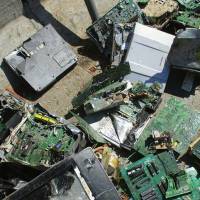 The scrap containing printed circuit boards seen in this undated photo was sent back to Japan from Thailand. | KYODO