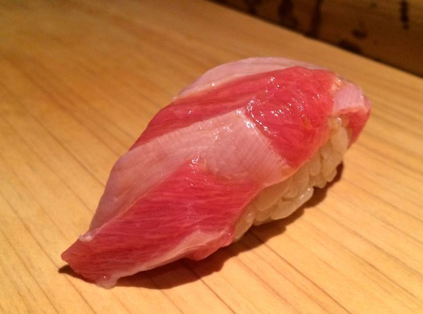 Sushi Gyoten A cut above: Premium quality otoro (fatty tuna) rests on the counter at Sushi Gyoten. | ROBBIE SWINNERTON