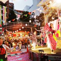 Members of the public join a free Bon dance staged by the Festival Fukushima” project in Ikenukuro’s West Gate Park during last year’s Festival/Tokyo. Festival/Tokyo speaks with a defiant voice