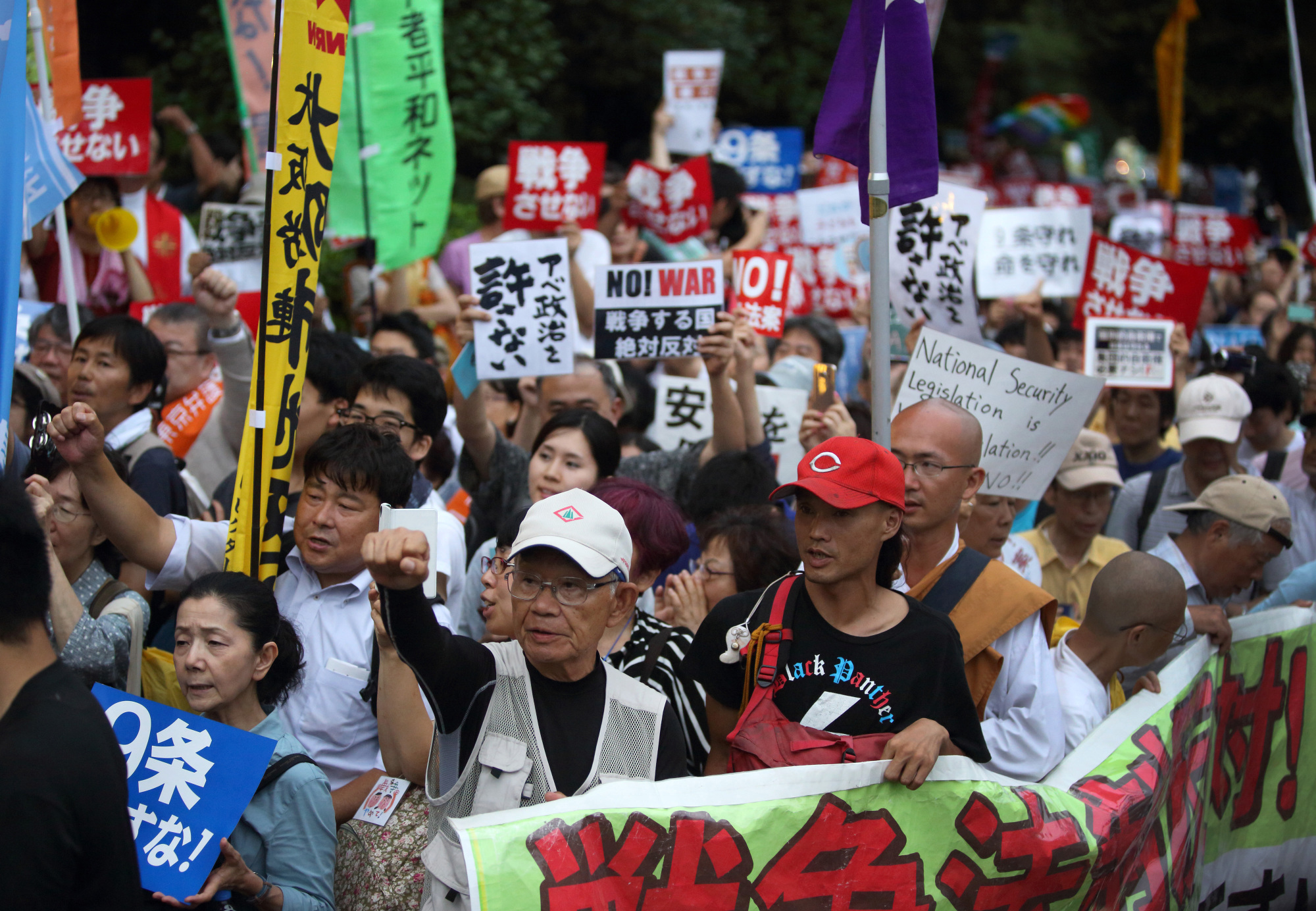 Loud and proud: Protesters take part in a rally against the security bills in Tokyo in 2015. | BLOOMBERG