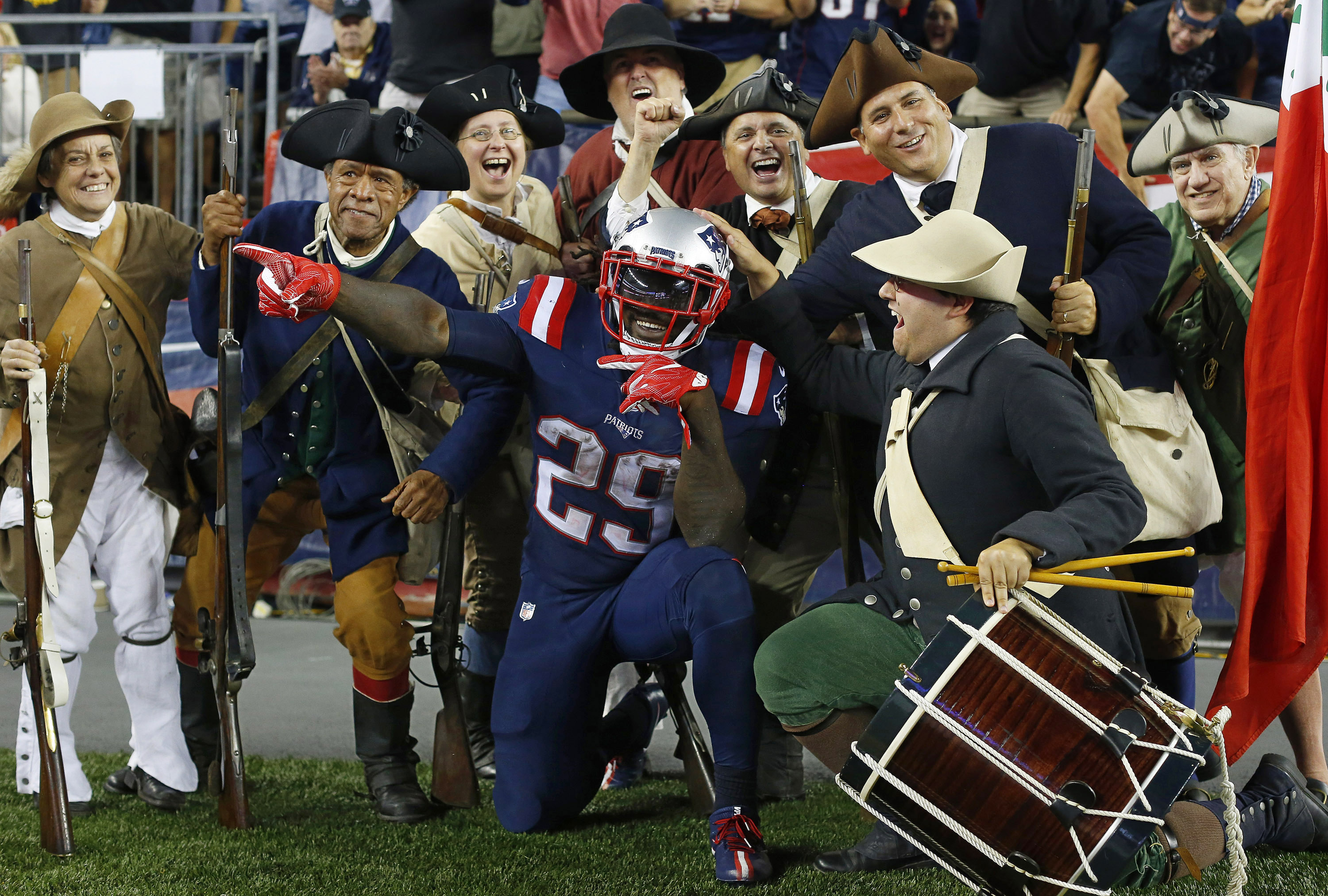 The New England Patriots' LeGarrette Blount celebrates a touchdown against the Houston Texans with the End Zone Militia at Gillette Stadium in Foxborough, Massachusetts, on Sept. 22. | WINSLOW TOWNSON / USA TODAY SPORTS / REUTERS