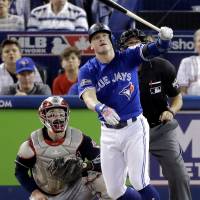 The Blue Jays’ Josh Donaldson watches his home run during the third inning of Game 4 of the ALCS on Tuesday. Blue Jays beat Indians to stay alive