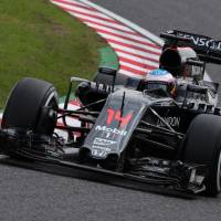 Fernando Alonso drives during practice for the Japanese Grand Prix on Friday in Suzuka, Mie Prefecture. Alonso feels Honda's all-Japanese approach bearing fruit