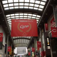 Carp signs are a major presence throughout Hiroshima. | JASON COSKREY