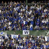 Chicago Cubs fans are rooting for the team to advance to the World Series and capture its first title since 1908. | AP
