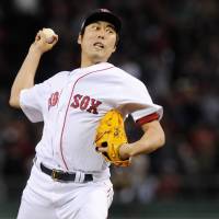 Red Sox reliever Koji Uehara pitches during Game 3 of the ALDS on Sunday in Boston. | USA TODAY / VIA REUTERS