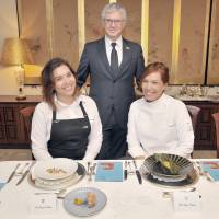 Visiting Colombian Chef Leonor Espinosa (right) and sommelier Laura Hernandez Espinosa (left) pose with Colombia\'s Ambassador Gabriel Duque while promoting Colombian cuisine during a luncheon event at the ambassador\'s residence in Tokyo on Oct. 5. | YOSHIAKI MIURA