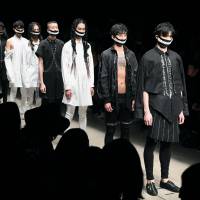 Models wear creations by South Korean designer Lee Chan-woo at the 2017 Spring/Summer Tokyo Collection during an event in Shibuya Ward on Monday. More than 40 fashion houses are scheduled to exhibit their work through Saturday. | KYODO