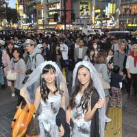 Ghost brides — from the  Halloween celebrations in Shibuya, Oct. 30.  | YOSHIAKI MIURA 