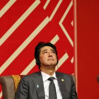 Japanese Prime Minister Shinzo Abe attends a meeting of the APEC Business Advisory Council in Lima on Saturday. | REUTERS