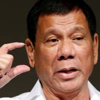 Philippine President Rodrigo Duterte delivers a speech in Tokyo on Oct. 26. | REUTERS