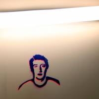 A sketch of founder and CEO Mark Zuckerberg is seen on a wall at the new headquarters of Facebook in Menlo Park, California, in 2012. | REUTERS