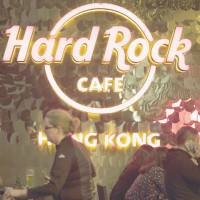 An sign is displayed on a terrace at the Hard Rock Cafe Hong Kong in February. Operator Hard Rock Cafe International Inc. is reportedly preparing to make a major investment in Japan, which is debating legalization of casinos.  | BLOOMBERG