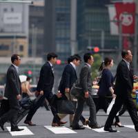 The government\'s push to raise wages may be forcing many people to work less. | BLOOMBERG