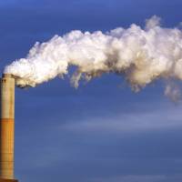 In this 2015 file photo, steam billows from the chimney or a coal-fired Merrimack Station in Bow, New Hampshire. The Paris Agreement on climate change came into force Friday after a year of remarkable success in international efforts to slash man-made emissions of carbon dioxide and other global warming gases. | AP