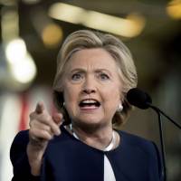 Democratic U.S. presidential candidate Hillary Clinton speaks at a rally at Eastern Market in Detroit on Friday. | AP
