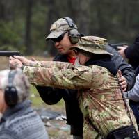 Brandon Rapolla, a founder of the Pacific Patriots Network, leads a firearms handling and safety class in Grants Pass, Oregon, in March. | REUTERS