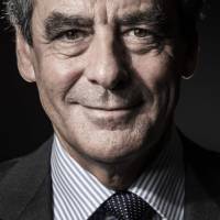 Francois Fillon, the center-right candidate in the 2017 French presidential election, poses for a portrait in Paris on Friday. | AFP-JIJI