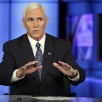 Vice President-elect Mike Pence is interviewed by host Sean Hannity during a taping of his program “Hannity” on the Fox News Channel, in New York, Tuesday. Infrequency of Trump's intel briefings raises concern