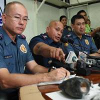Philippine police chief Director-General Ronald Dela Rosa speaks at a press conference about the improvised explosive device found by a street sweeper near the U.S. Embassy. | AFP-JIJI