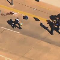 This still image taken from an aerial video provided by KWTV shows police responding to a shooting at Will Rogers World Airport in Oklahoma City on Tuesday. Police say the airport has been closed following the shooting there. Airport spokeswoman Karen Carney says all operations are suspended. | KWTV VIA AP