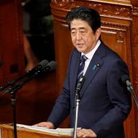 Prime Minister Shinzo Abe gives an address at the start of the Diet session at the Lower House in Tokyo on Sept. 26. | REUTERS