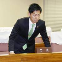Mayor Hiroto Fujii tells the Minokamo Municipal Assembly on Monday that the Nagoya High Court has overturned his acquittal in a bribery case. | KYODO