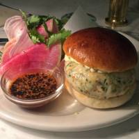 Shrimp burger with jalapeno mustard mayo, shaved red daikon radish salad and sesame gochujang sauce | ROBBIE SWINNERTON