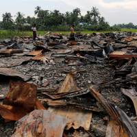 Scorched earth: The ruins of a market that was set on fire are seen at a Rohingya village outside Maugndaw in Rakhine state, Myanmar. | REUTERS
