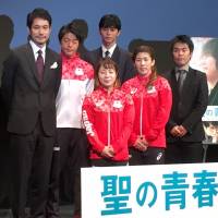 From left, Kenichi Matsuyama, Takuya Haneda, Hiromi Miyake (front), Masahiro Higashide (back), Saori Yoshida and Yoshitaka Mori pose before the premiere of “Satoshi: A Move for Tomorrow,” which was screened at EX Theater Roppongi on Wednesday as the closing film of the Tokyo International Film Festival. | AFP-JIJI