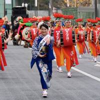 Women perform a sample of the the Sansa Odori. The real festival, however, features 10,000 dancers and drummers, which puts it in the Guinness Book of Records for being the largest taiko festival in the world. | MARK THOMPSON